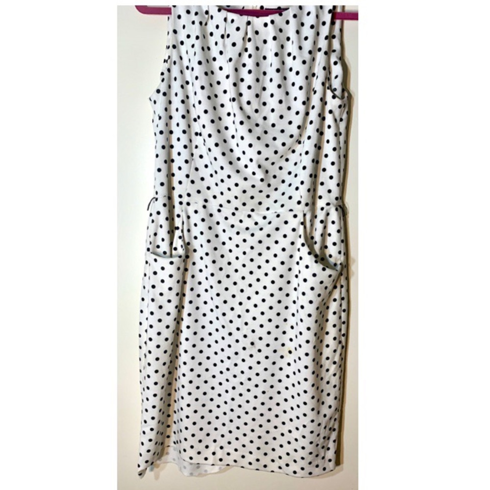 Champs white with black polka dot dress.